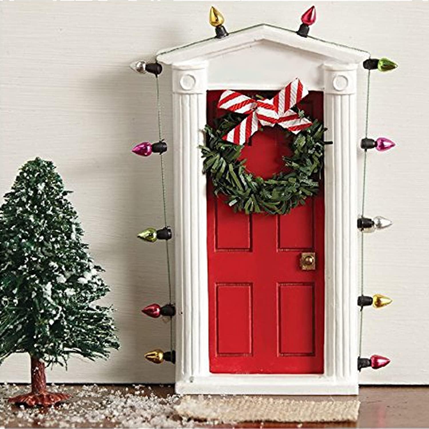 image:imageStanding miniature dimensional door surrounded with lights and tiny faux wreath with bow allows special entry for fairies and elves